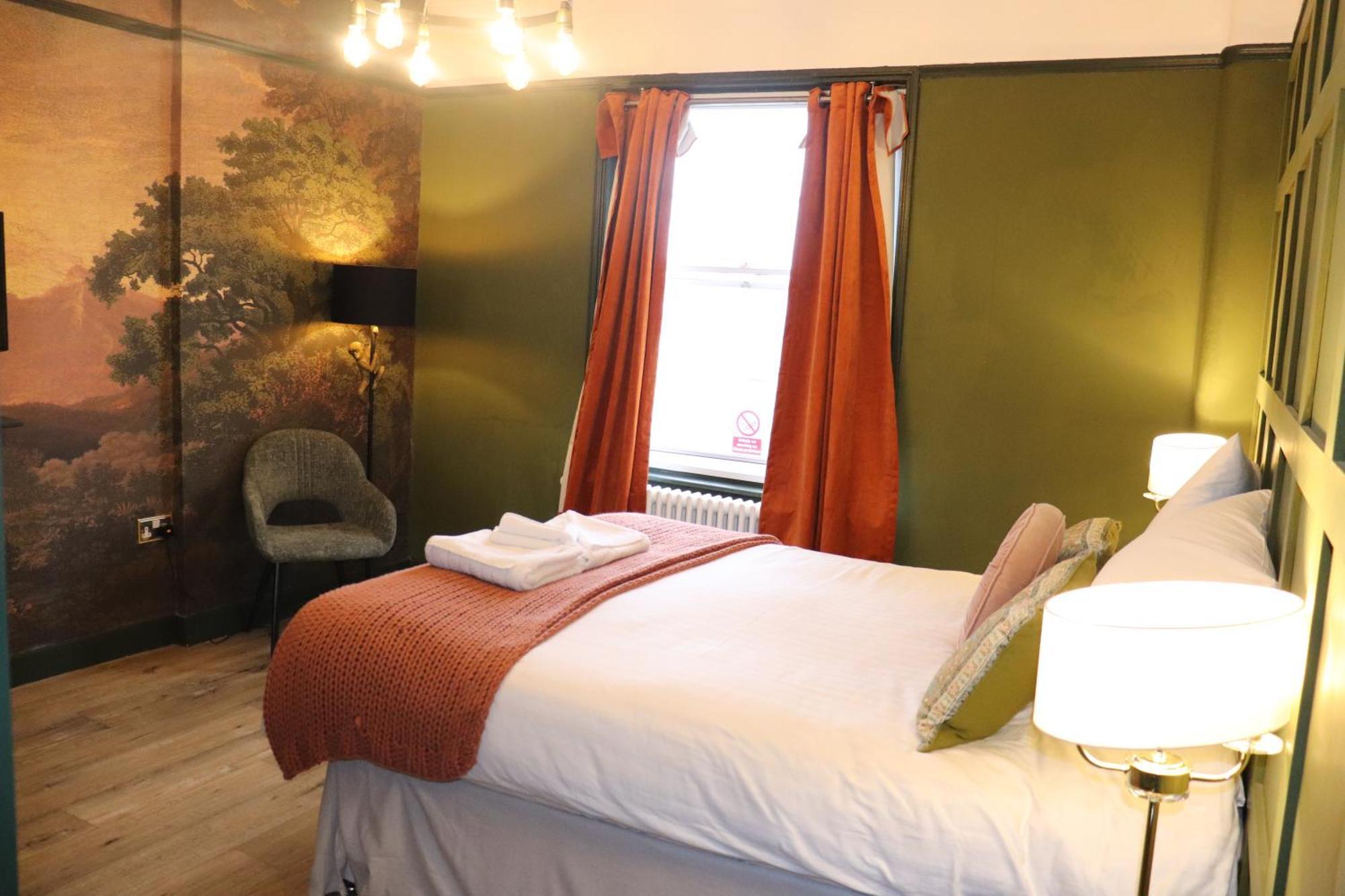 Rooms On The Prom เชลเทนแฮม ภายนอก รูปภาพ